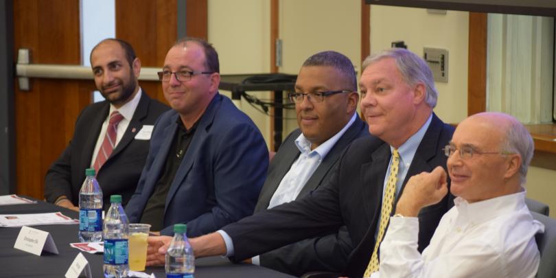 Real Estate professionals gather to discuss the real estate field.