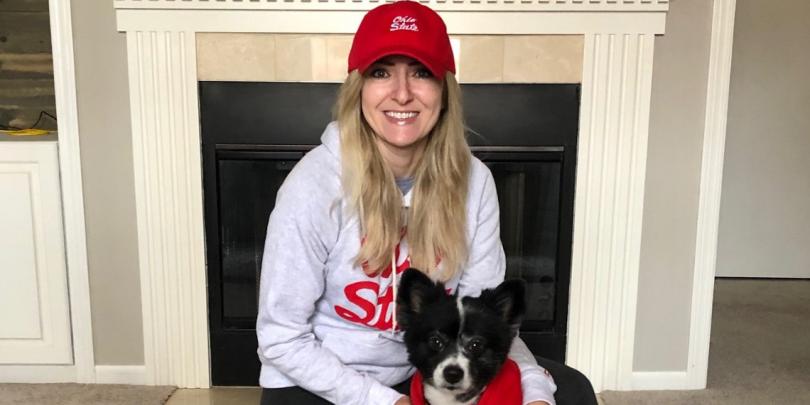 Alyssa and her dog in OSU gear