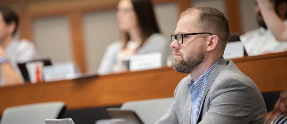 Professional listening to a speaker
