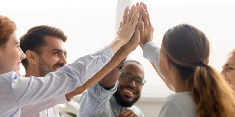 People doing a high-five