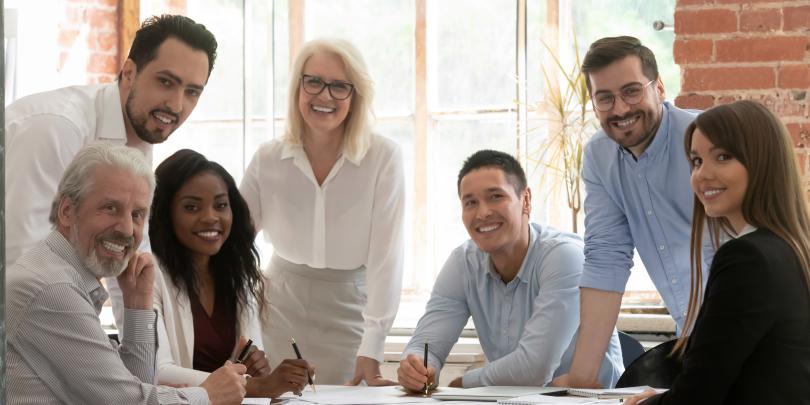 People in office smiling
