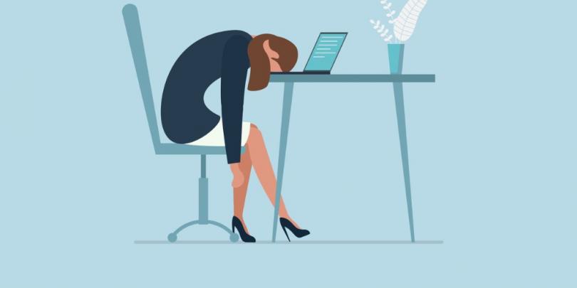 Illustration of woman face-down on desk looking sad