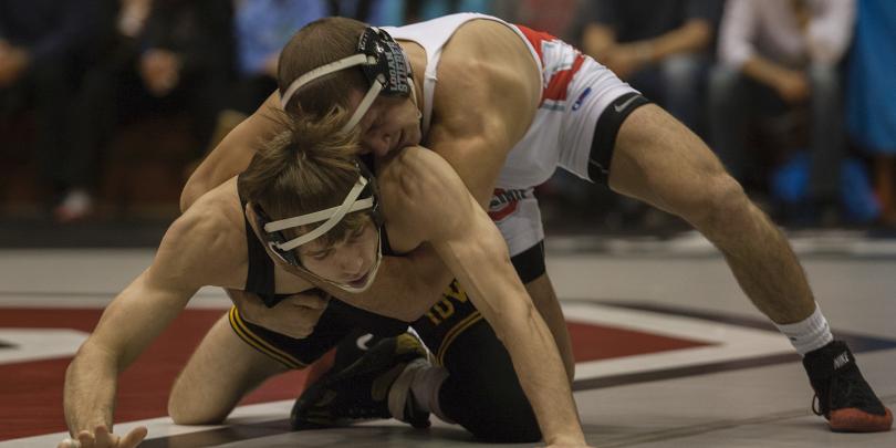 Logan Stieber wrestles an opponent