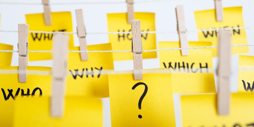 Post-it notes with words on them like "when" and "what"