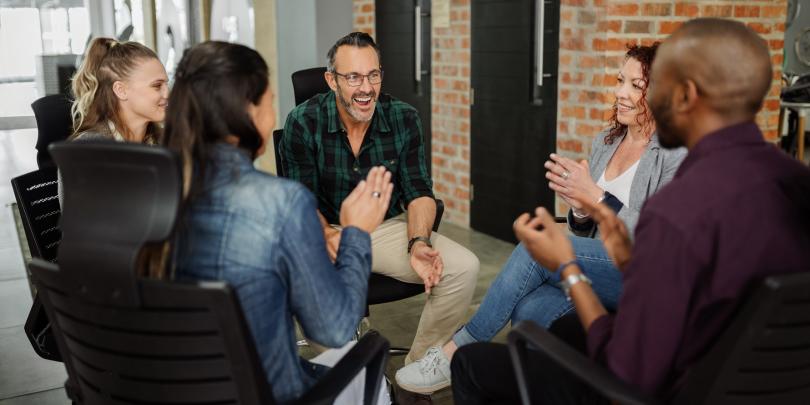 a team gathering in the conference room