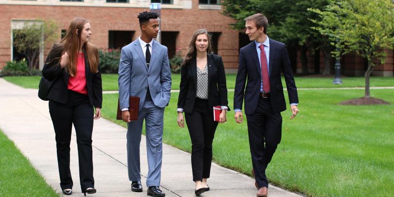 Students walking through Fisher campus