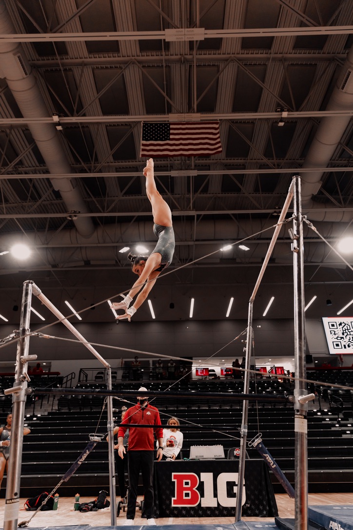 Nicole Riccardi competes in the uneven bars.