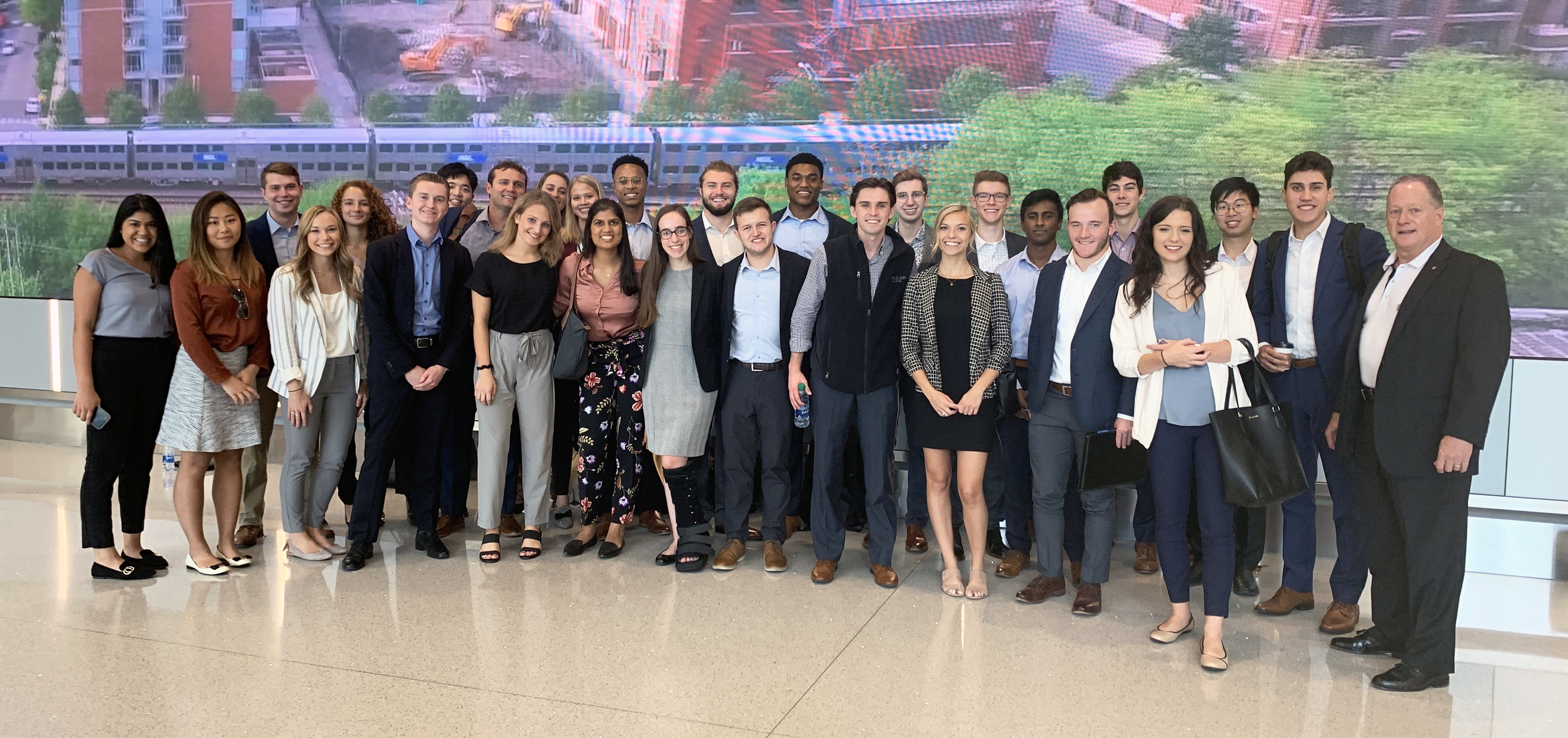 Honors Cohort students visit with alumnus Moe Modecki in Chicago.