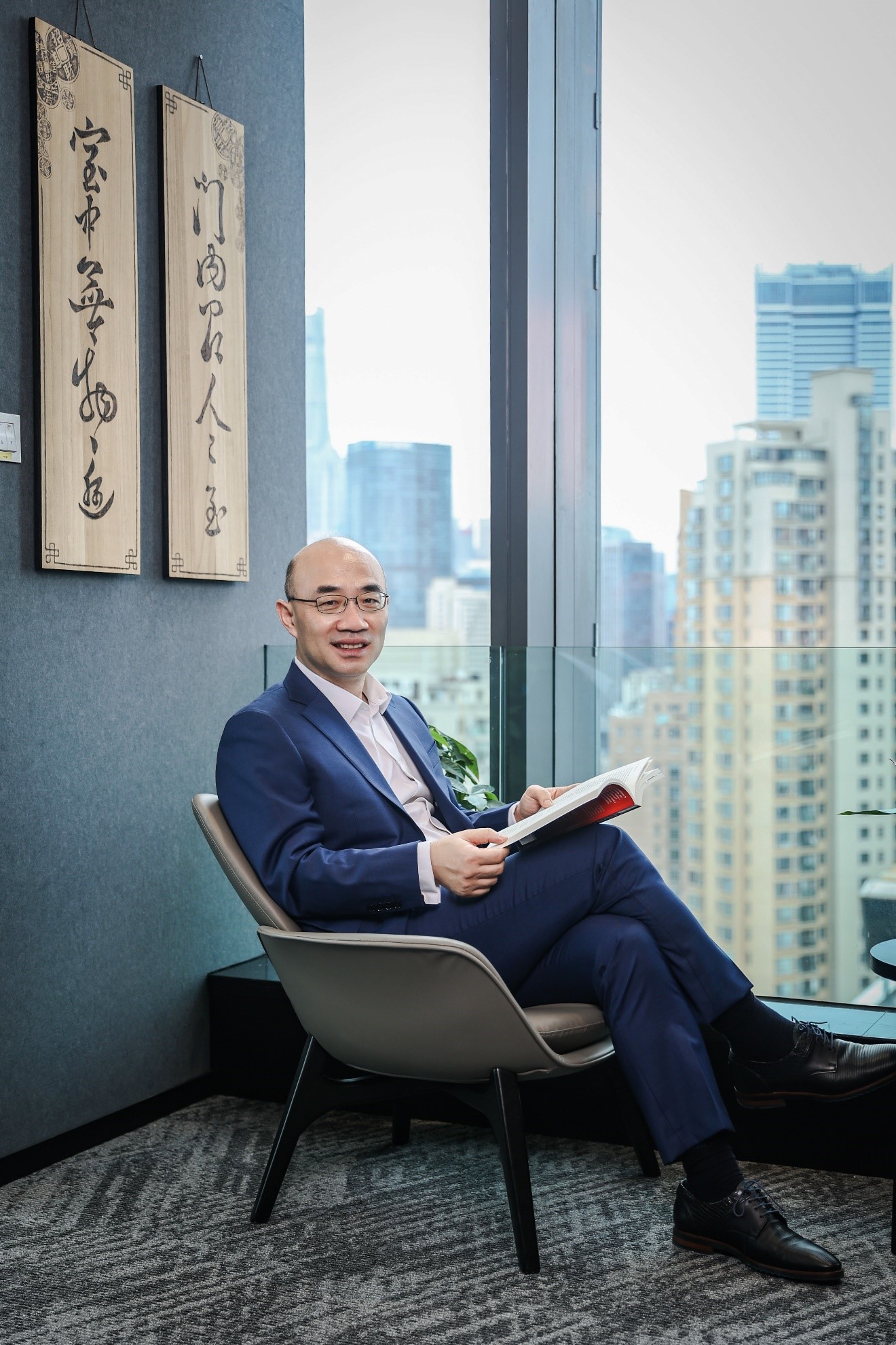 Song Qi seated in his Shanghai office.