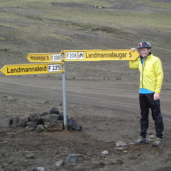 Steve Merriett at a crossroads during a bicycling trip to Iceland