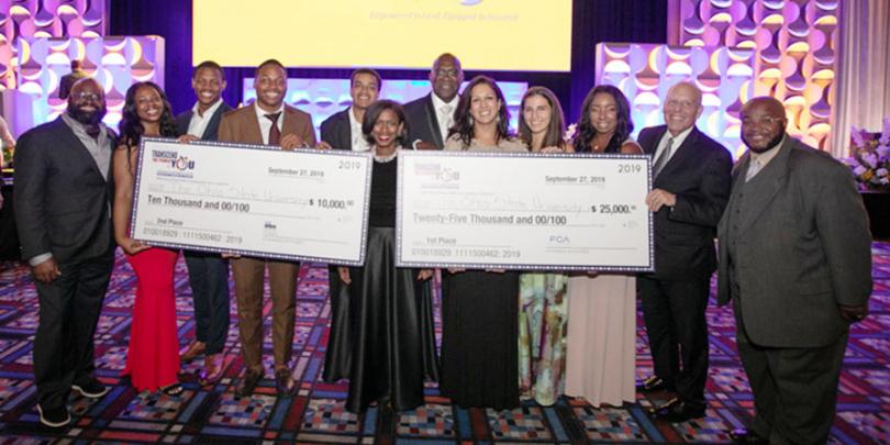Fisher's NBMBAA case competition teams with their checks