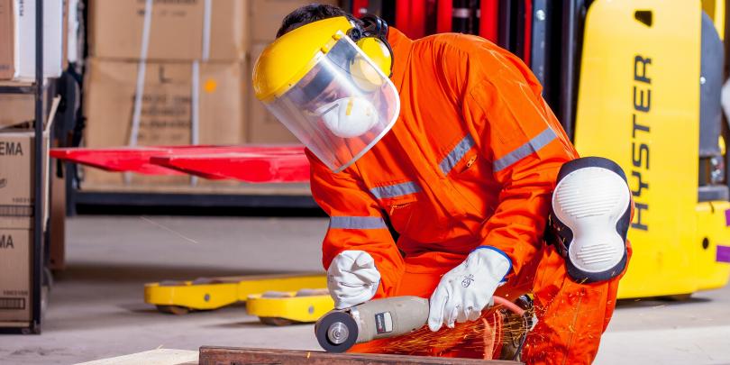 Stock image of a worker in safety gear