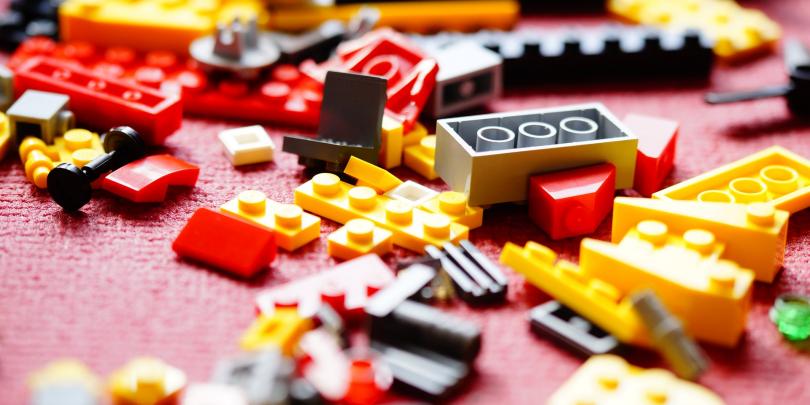 A pile of LEGOs on a floor