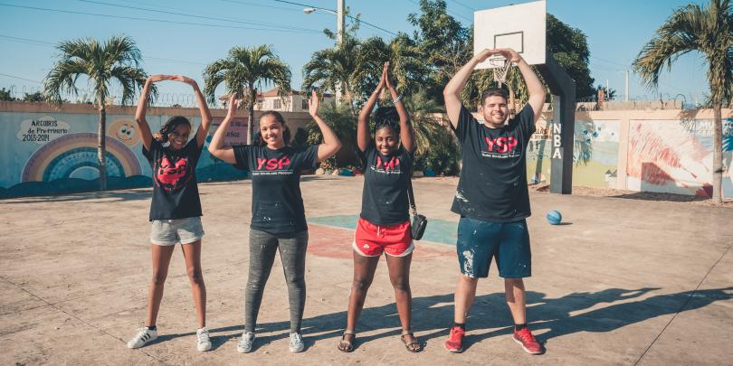 Students abroad posing O-H-I-O