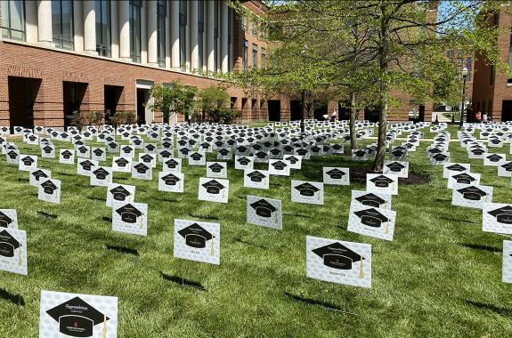 Photo of commencement signs on Fisher campus