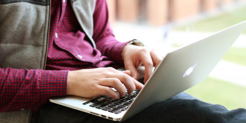 Students on his computer