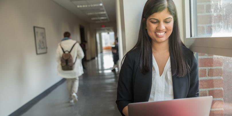 Student looking at Laptop